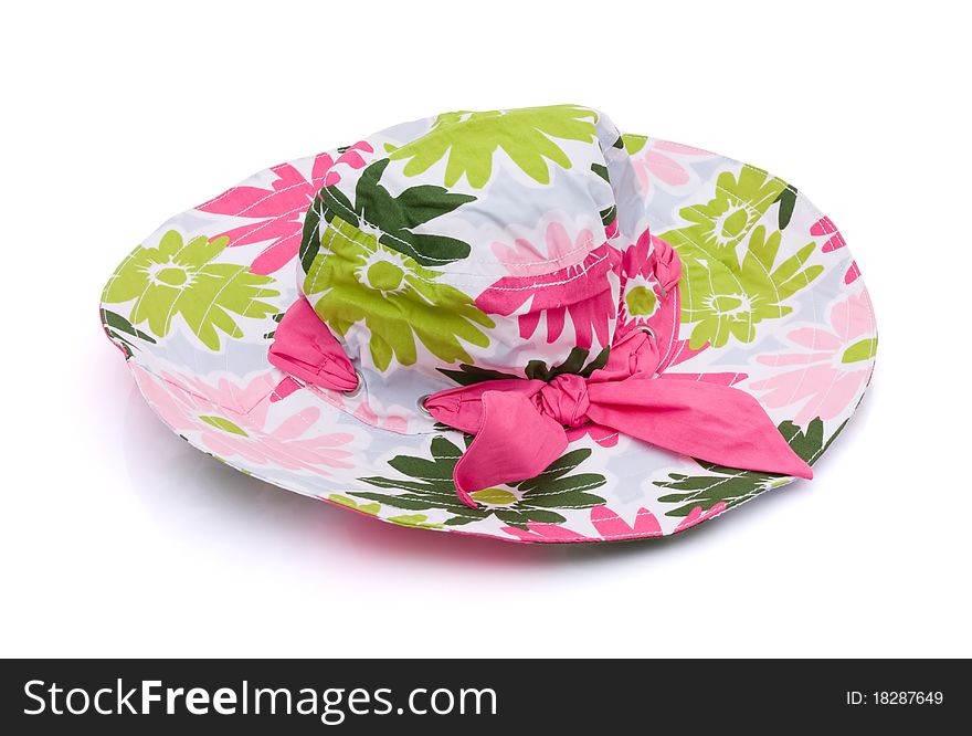 Pink flowered sun hat on a white background, floppy sun hat