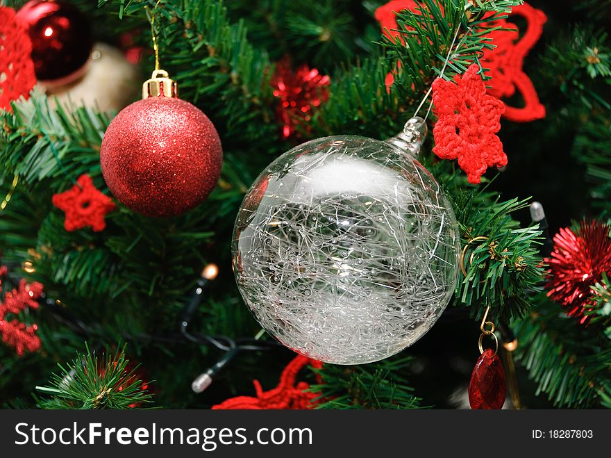 Glass ball Christmas tree up with doilies red decorative casts. Glass ball Christmas tree up with doilies red decorative casts