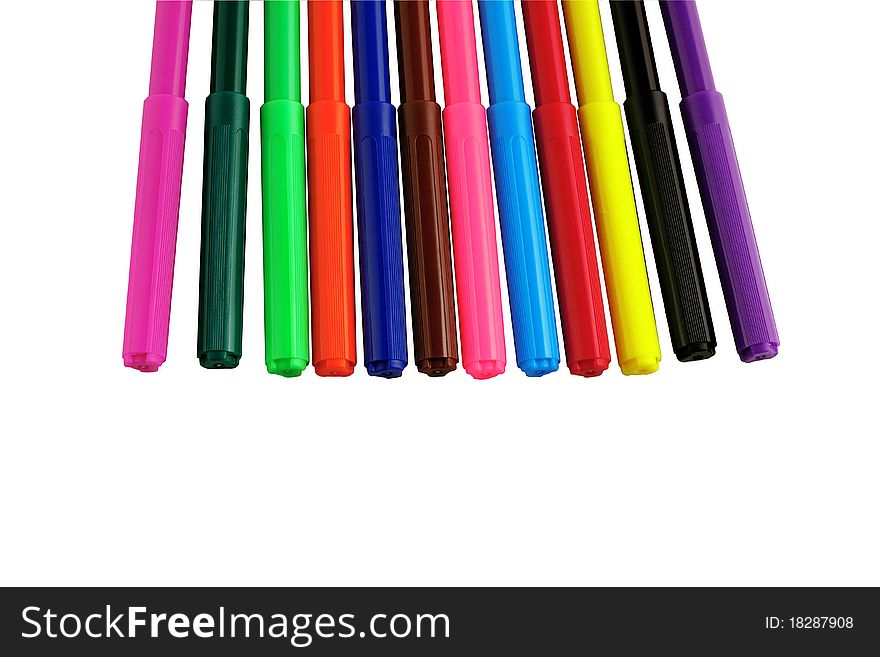 Colored markers on white background