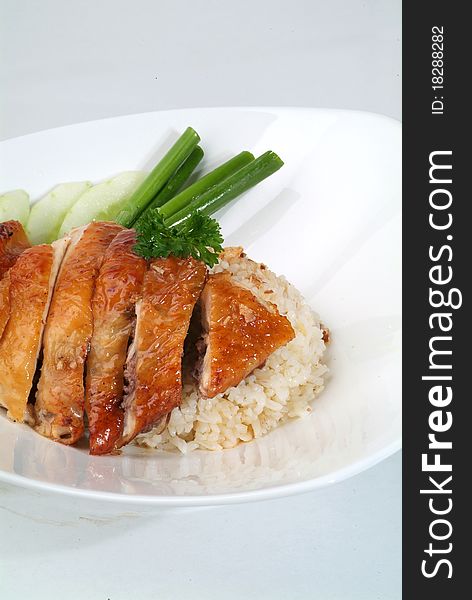 A plate of traditional malaysian chinese chicken rice