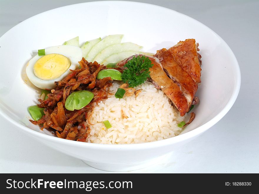 A plate of traditional malaysian chinese chicken rice