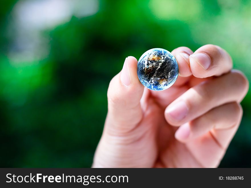 World in hand concept photo