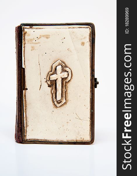 Old prayer book isolated on a white background.