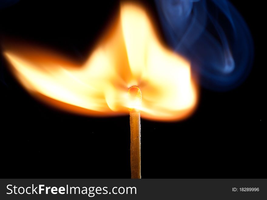 Matchstick with the flame of fire and smoke. Matchstick with the flame of fire and smoke