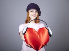 Beautiful Red-haired Girl With Toy Heart. Royalty Free Stock Images Beautiful Red-haired Girl With Toy Heart. Royalty Free Stock Images