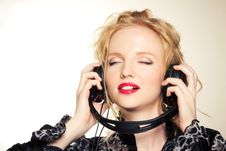 Woman With Headphones Listening To Music Royalty Free Stock Photography Woman With Headphones Listening To Music Royalty Free Stock Photography