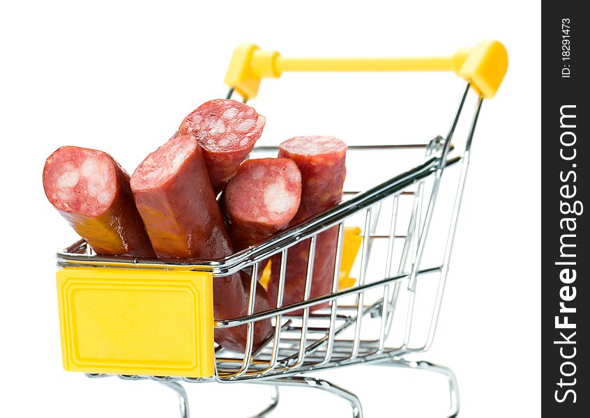 Salami sausage in the shopping cart. Isolated.