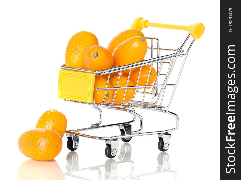 Tangerine in the shopping cart. Isolated.
