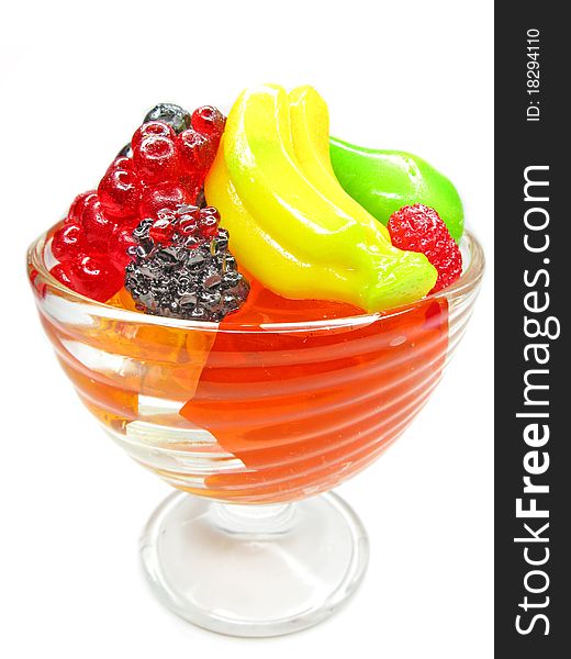 Fruit dessert with dairy pudding and jelly fruits