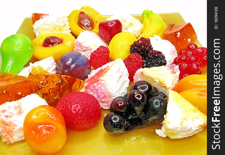 Marmalade gelatin fruits dessert with curd pudding isolated