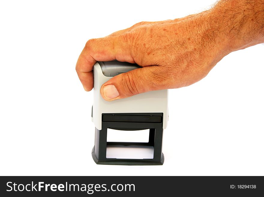 Hand with stamp isolated on white background.