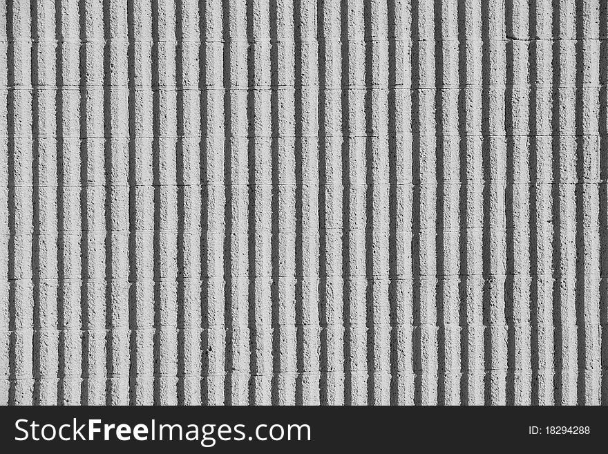 A white Concrete Wall with Stripes