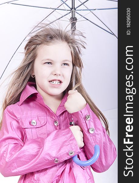 Girl posing with umbrella isolated on white