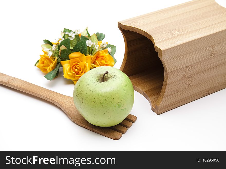Apple onto cook spoons with flowers