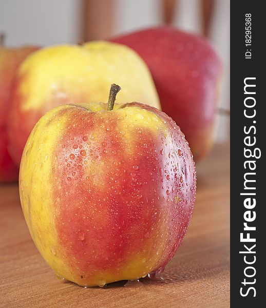 Close up colorful apple with water drops. Close up colorful apple with water drops