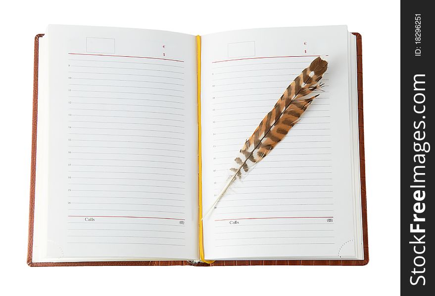 Diary with a pen isolated on a white background