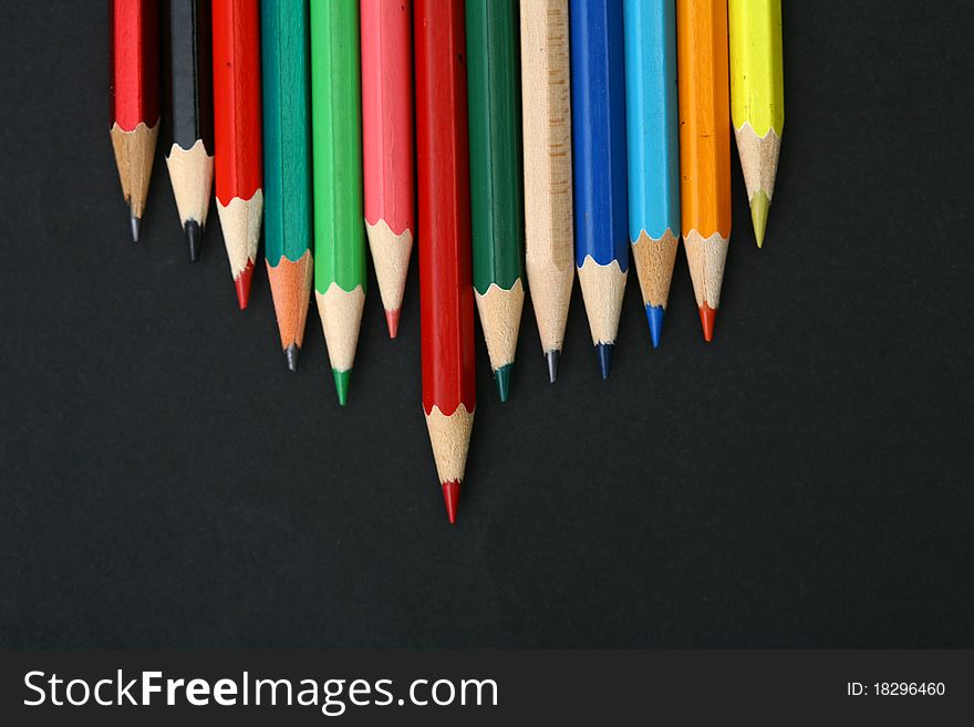 Background-color close-up image of a pencil. Background-color close-up image of a pencil