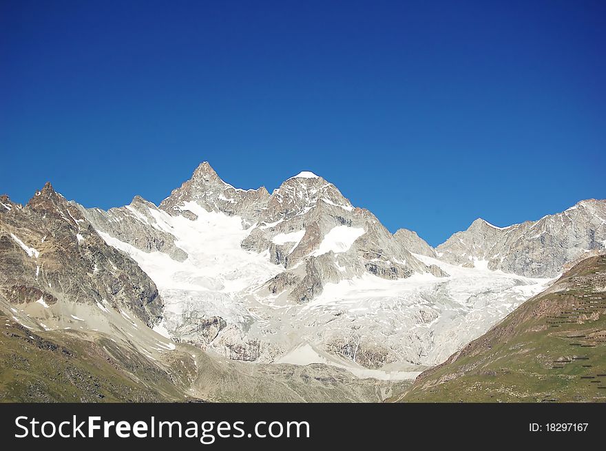 Mount Ober Gabelhorn towering over Zermatt-Swiss