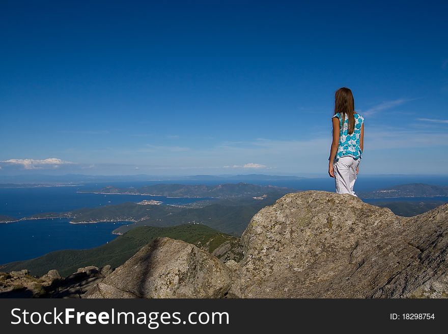 Young girl looking at the island view