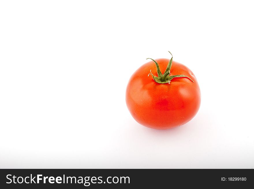 Red tomatoes on white background