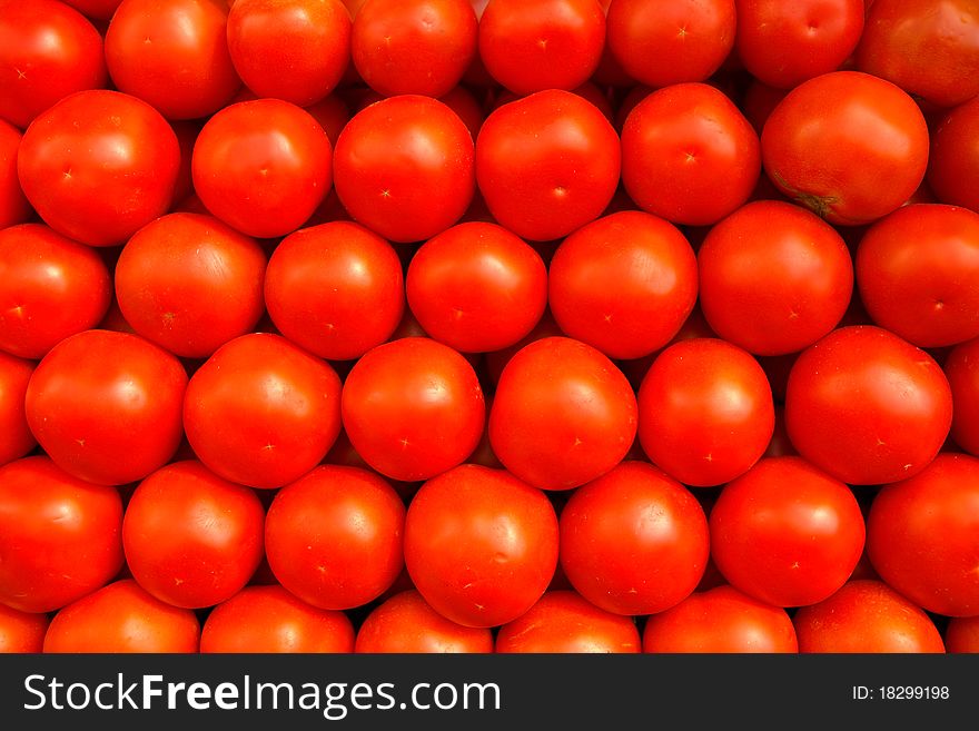 Red tomatoes on the counter