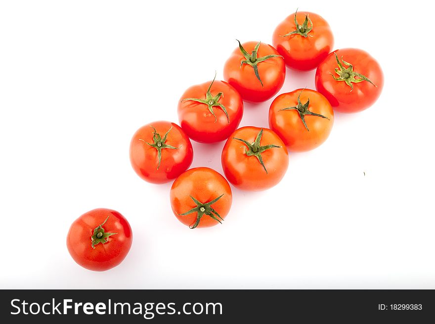 Red tomatoes on white background