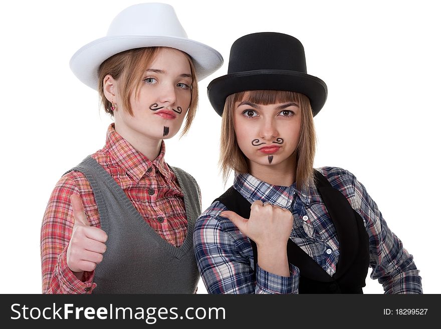 Two girls with painted mustaches and bowler hats on white background