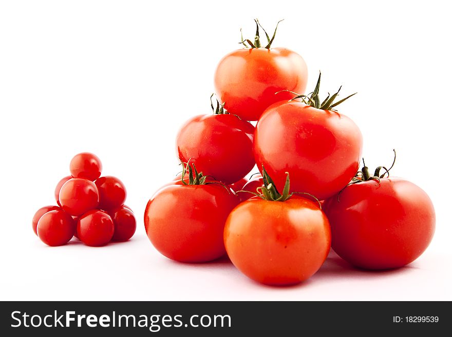 Red tomatoes on white background