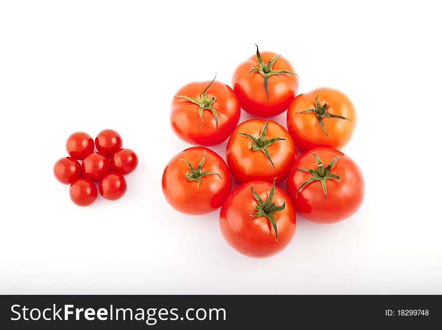 Red tomatoes on white background