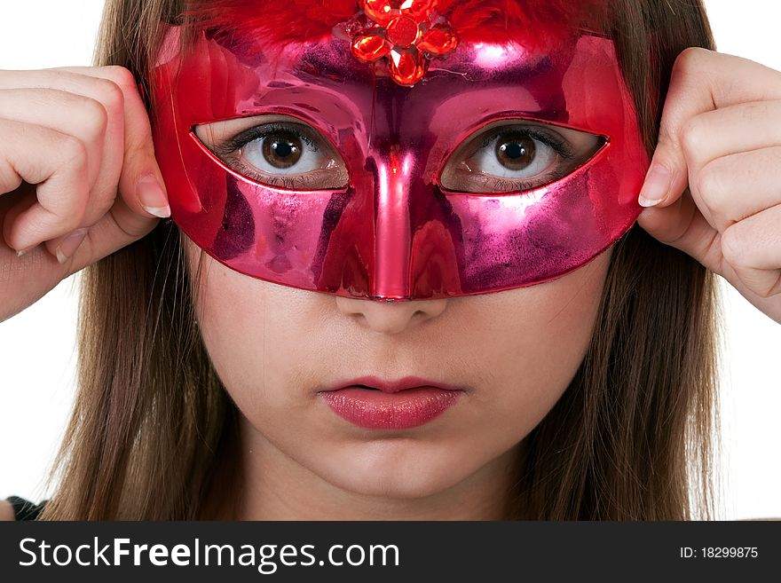 Portrait girl in the red masquerade mask on a white background