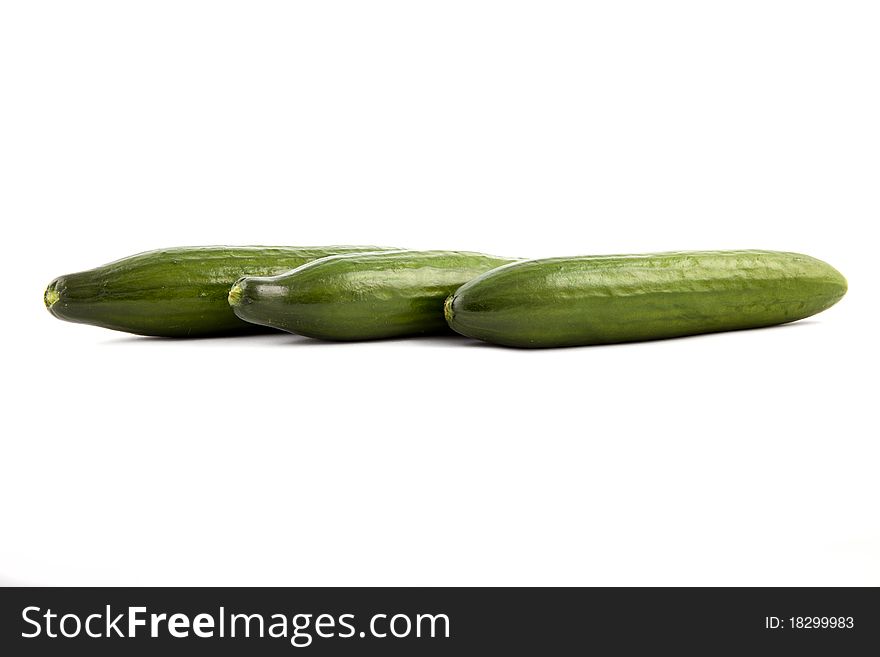 green cucumber on a white background. green cucumber on a white background