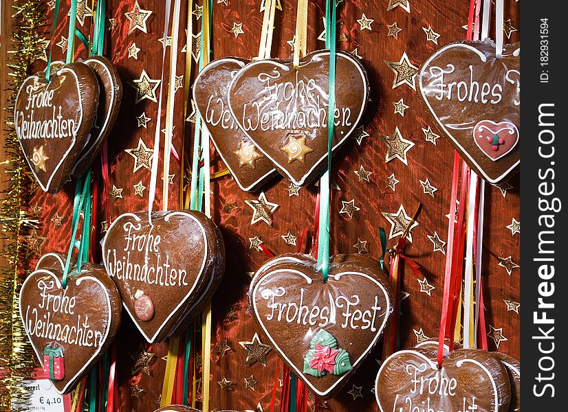 Many gingerbread cookies over the counter, during Vienna Christmas Market. Heart, snow flake, unicorn shape sweet dessert for sale,festival winter celebration. Merry Christmas candy bar buffet concept. Many gingerbread cookies over the counter, during Vienna Christmas Market. Heart, snow flake, unicorn shape sweet dessert for sale,festival winter celebration. Merry Christmas candy bar buffet concept