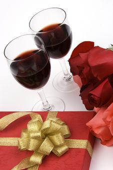 Roses With Present And Wine Royalty Free Stock Photography Roses With Present And Wine Royalty Free Stock Photography