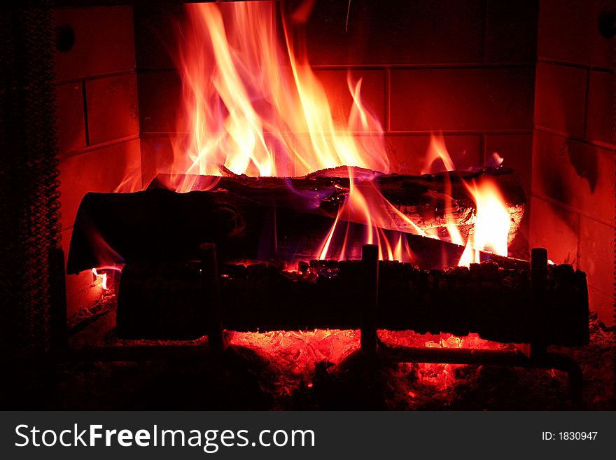 A warm, cozy, bright fire in the winter. A warm, cozy, bright fire in the winter