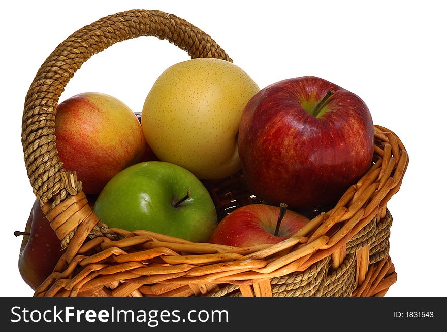 Variety of apples in basket with white background.