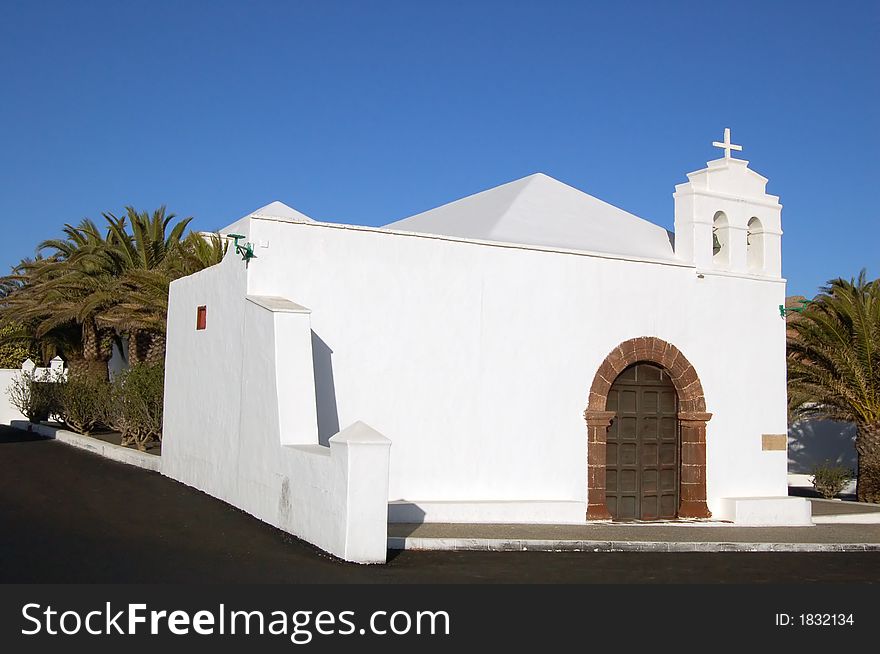 A small white Spanish chapel. A small white Spanish chapel