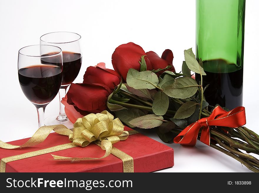 Roses With Present And Wine