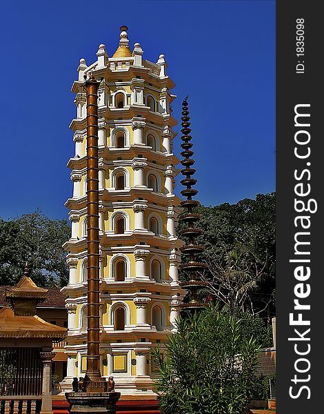 The Buddhist tower costs in a court yard of a Pagoda.