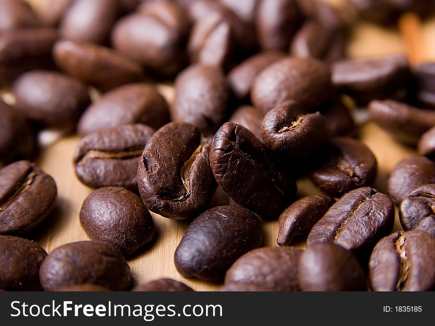 Coffee beans background texture. Close-up.