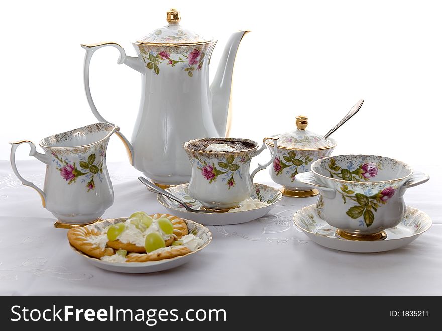 Coffee and cookies in ceramic pot. Coffee and cookies in ceramic pot.