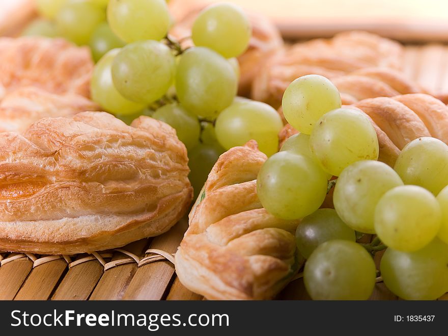French cookies with grapes background texture.