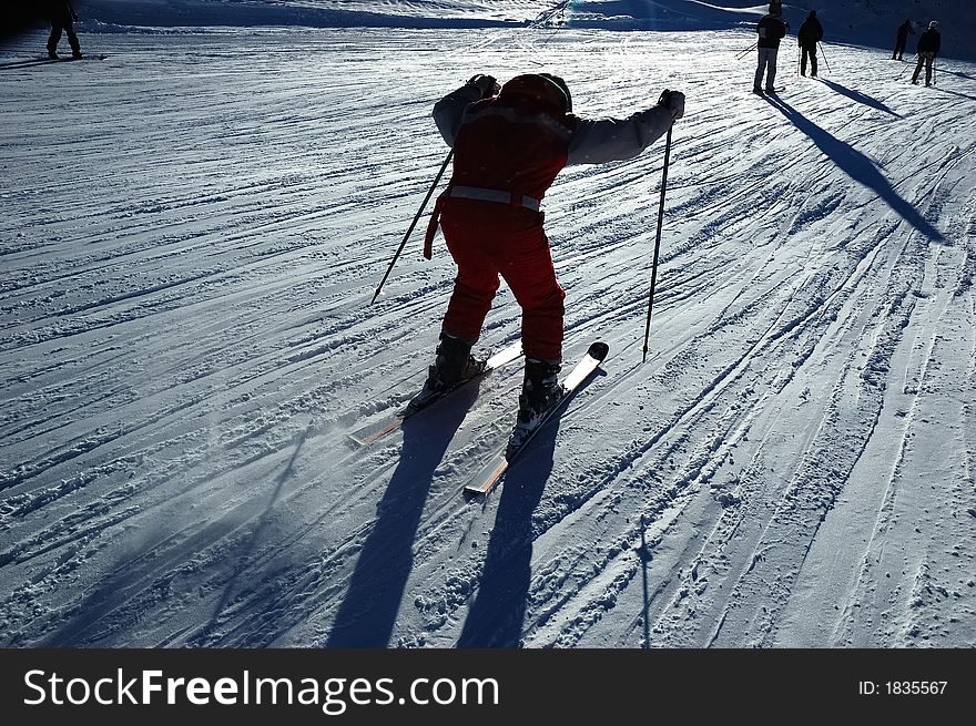 Skier in backlight, west Alps, Italy. Skier in backlight, west Alps, Italy.