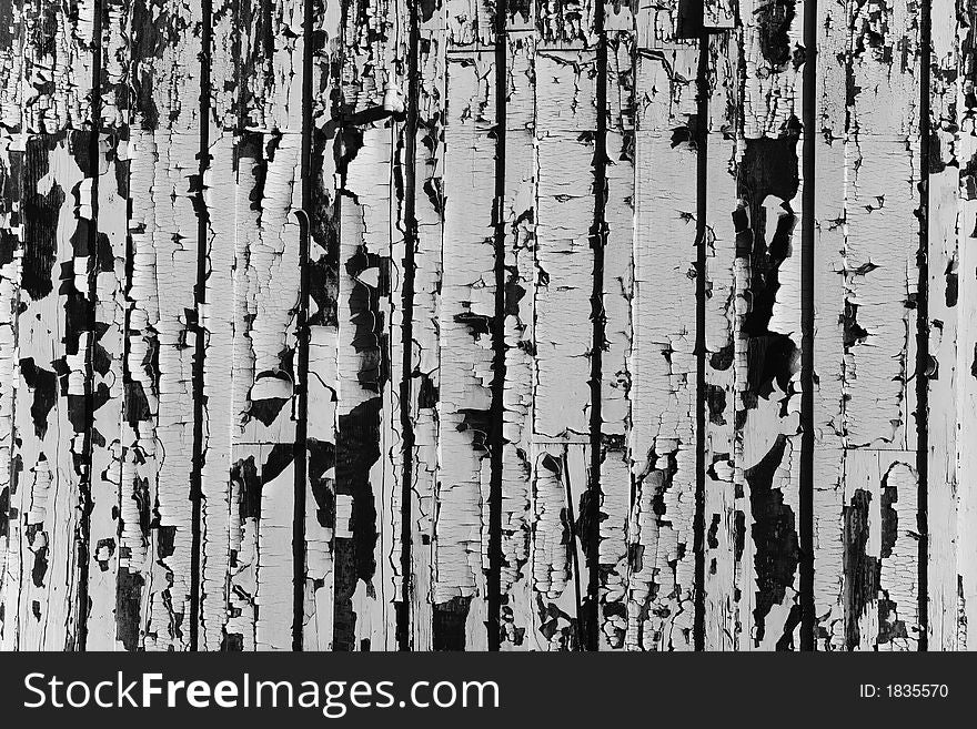 Shot of an old weathered building that has peeling paint.