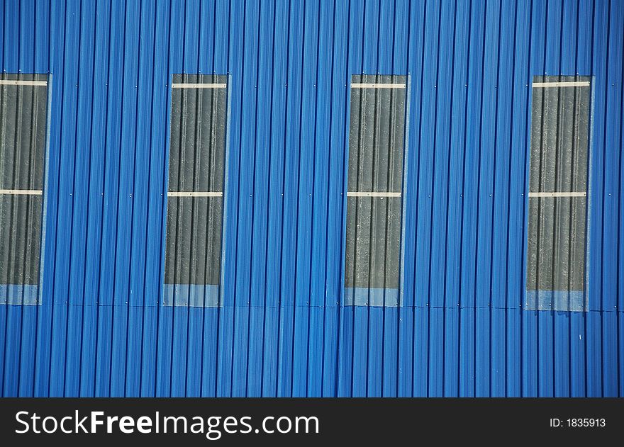 Blue roof with with sky window showing parallel lines. Blue roof with with sky window showing parallel lines