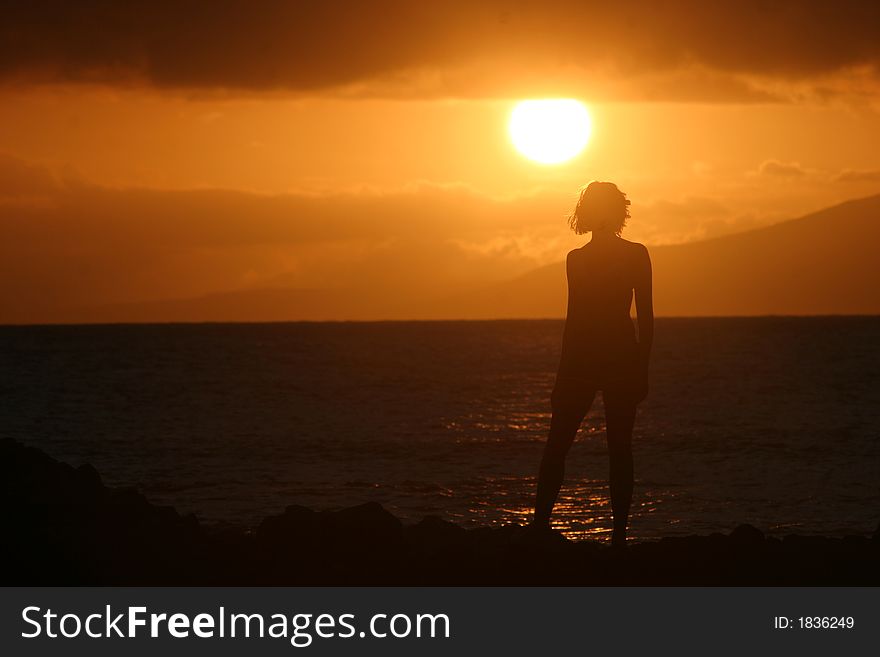 Sunset on Maui, capturing the feminine figure at dawn. Sunset on Maui, capturing the feminine figure at dawn.