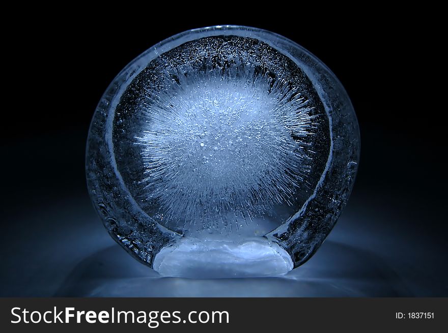 Lump of ice with oxygen explosion inside. Lump of ice with oxygen explosion inside