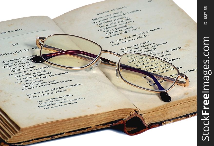 Glasses For Reading Lie On The Exposed Old Book
