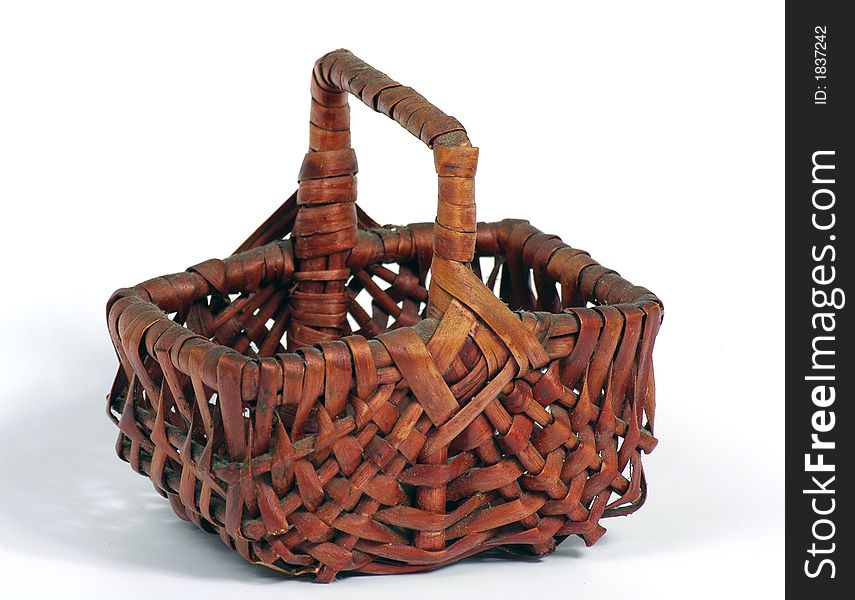 Old basket on a white background