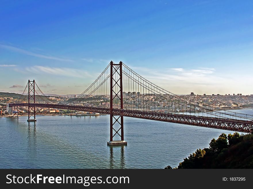 Lisbon bridge in Portugal with view on the city