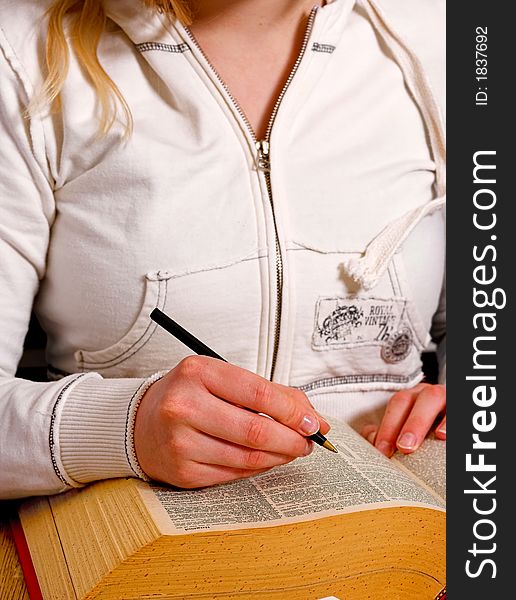 Young girl studying for graduation